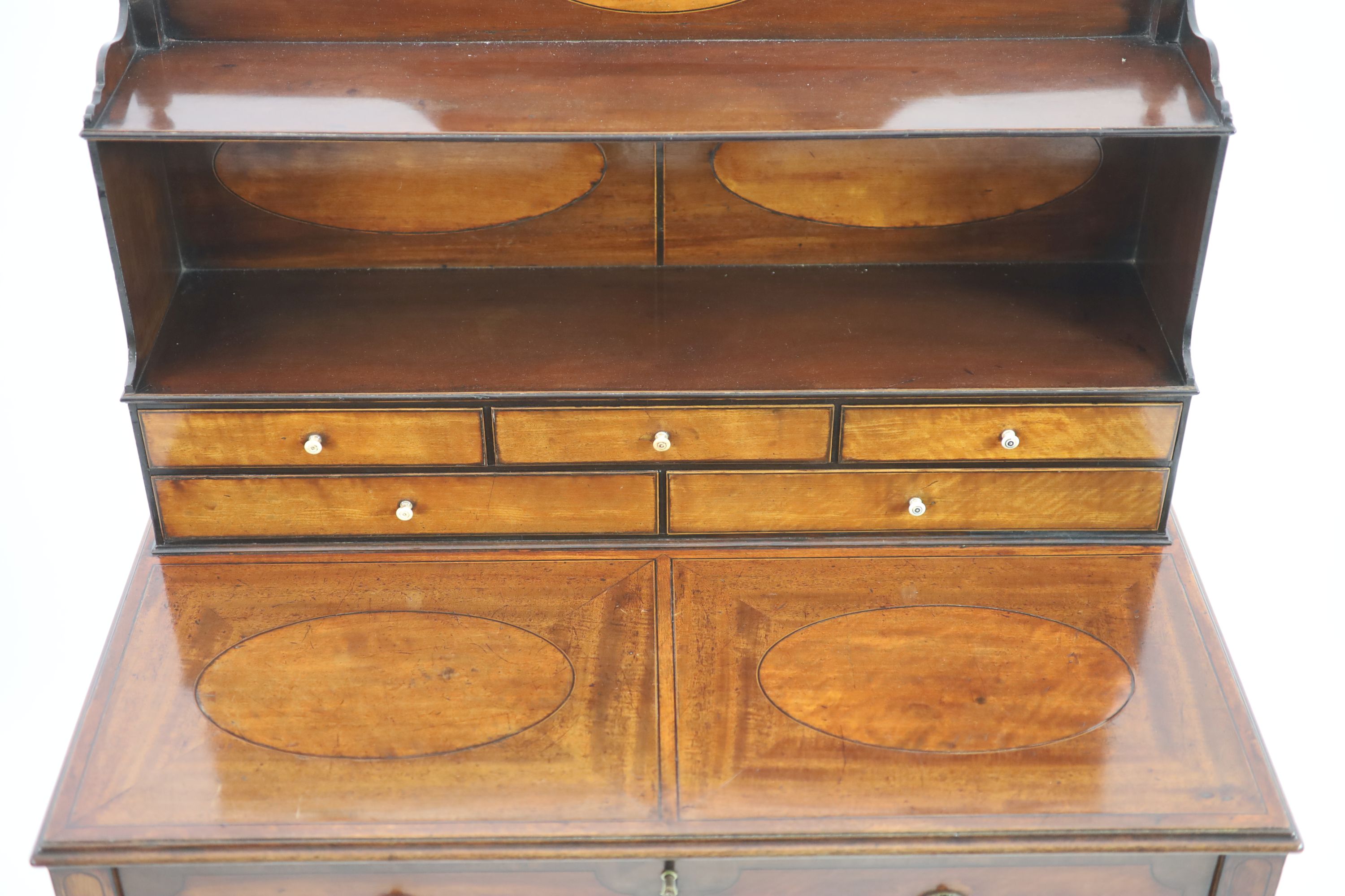 A George III Sheraton style mahogany and harewood bonheur du jour, W.78cm D.47cm H.130cm